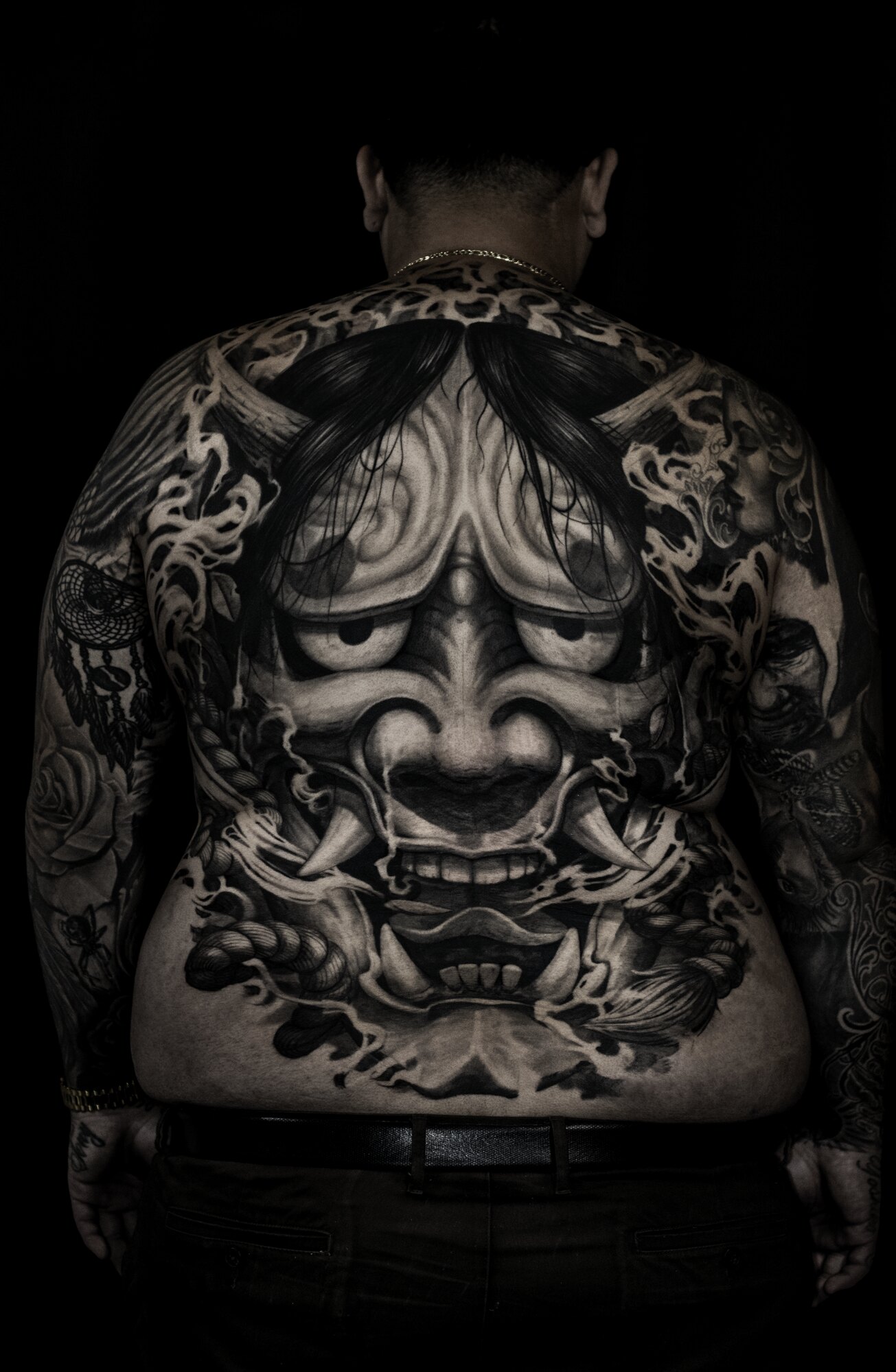 Black and grey hannya backpiece tattoo